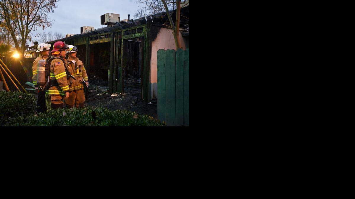 
Merced City Fire and Cal Fire Merced County crews work to secure the scene of an early morning structure fire Wednesday in the 300 block of T Street in Merced. According to Merced City Fire Department Battalion Chief Billy Alcorn, the fire, which has been ruled suspicious, started in a vacant unit of an 11-unit Merced Golden Manor apartment complex near the intersection of T Street and West 3rd Street. No injuries were reported, and the American Red Cross was present on scene to assist with shelter and care of displaced residents.
