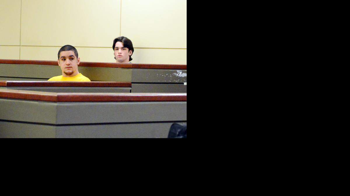 
Jacob Tellez, left, and Ethan Morse, both 18, wait inside a Merced County courtroom for their preliminary hearing to begin on Monday. They are co-defendants accused of killing 18-year-old Bernabed Hernandez-Canela on March 30, 2013, when he was shot near an orchard outside a large house party near Atwater.

