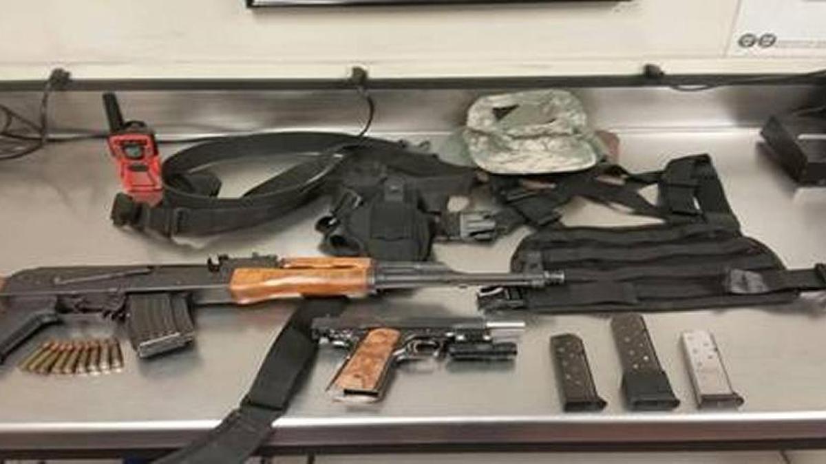 Officers seized weapons and body armor Friday during the arrest of two suspected gang members in Merced.