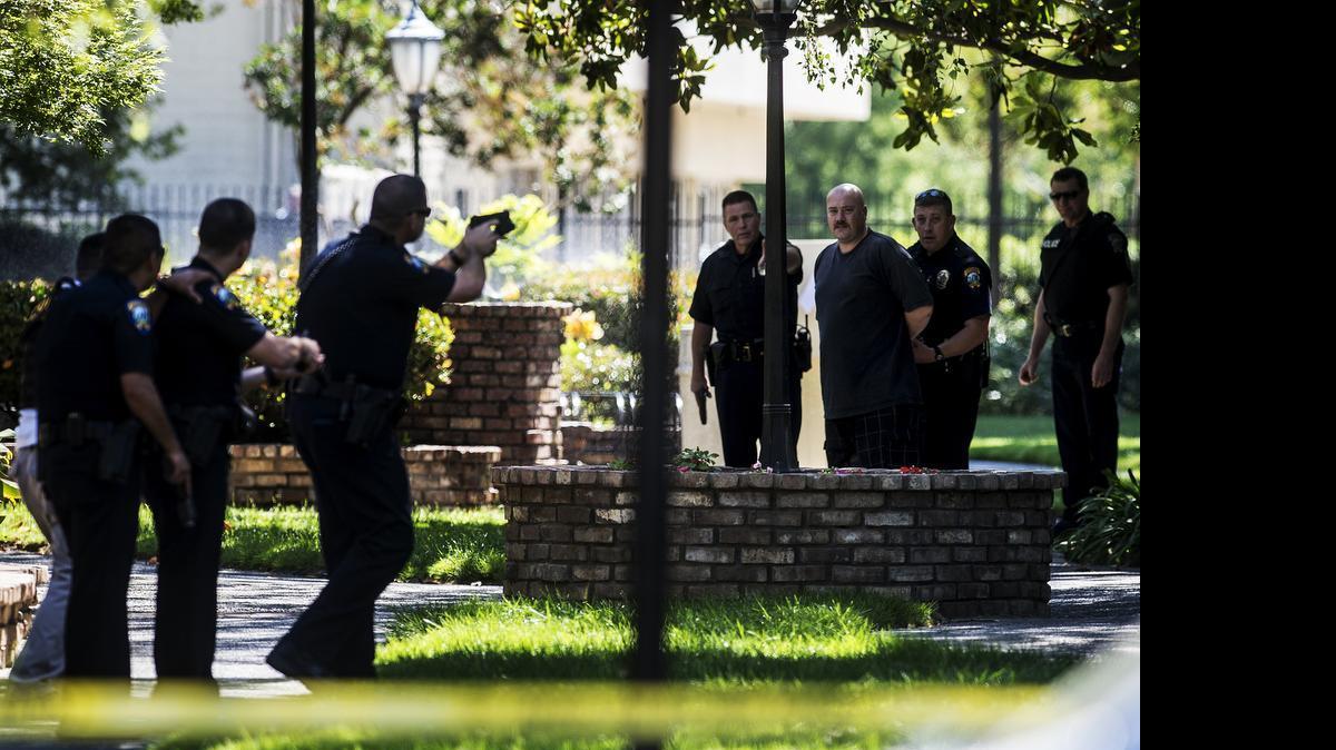 
.Merced police arrest a suspect after a standoff at the Normandy Apartments at the Swiss Colony Apartments complex in Merced on Wednesday.
