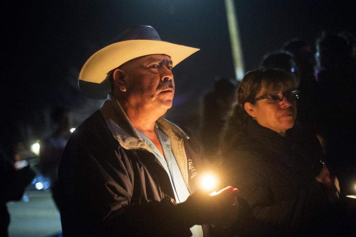 Community members gather for a candlelight vigil and town walk at Houlihan Park in Planada, Calif., on Tuesday, Feb. 6, 2018. The vigil was organized by Le Grand High School students after three men were shot in front of a food truck at the intersection of Highway 140 and North Plainsburg Road on Thursday, Feb. 1, 2018. According to the Coroner's Office two of the shooting victims, Diego Gallardo, 22, and Pedro Lua, 27, died. A third victim was in critical condition following the shooting, according to the Merced County Sheriff's Office.