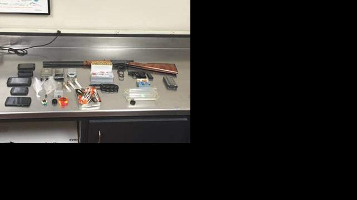 
Officers seized two firearms and other weapons along with heroin, methamphetamine, marijuana and needles Wednesday after arresting a man at a home on West 22nd Street in Merced, the Police Department reported.
