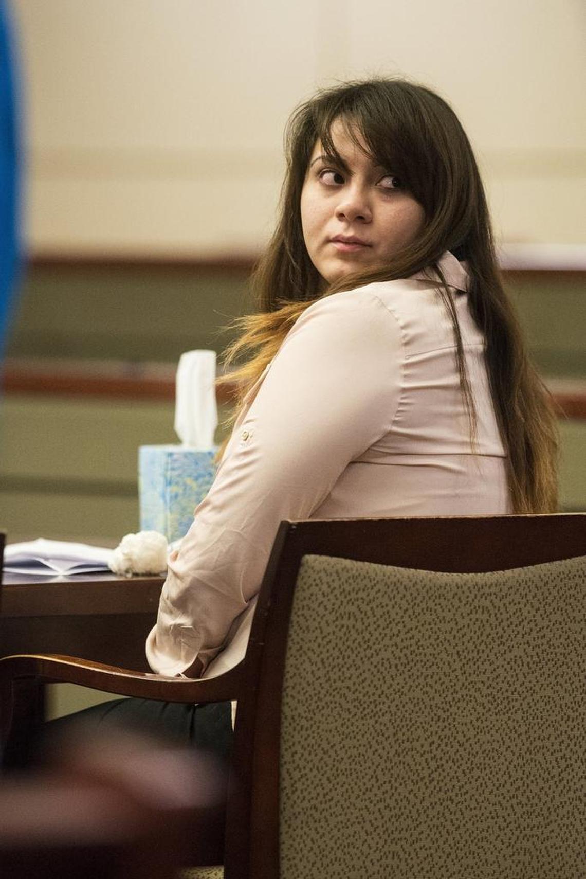 Obdulia Sanchez, 18, of Stockton, turns to look at her family members as they address Judge Ronald W. Hansen during a sentencing hearing in the Merced County Superior Courthouse in Merced, Calif., on Thursday, Feb. 8, 2018. Sanchez was sentenced to six years and four months in prison for gross vehicular manslaughter, DUI and child endangerment for a crash which killed her 14-year-old sister Jacqueline Sanchez and injured 15-year-old Manuela Ceja in July of 2017.