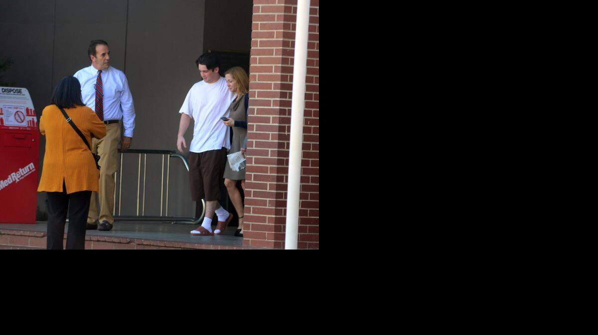 
Ethan Morse, 18, is shown leaving the Merced County Jail with his father, Merced County District Attorney Larry Morse II, and his mother Cindy Morse. Ethan Morse was released Friday after Judge Ronald Hansen dismissed homicide charges against him and co-defendant Jacob Tellez. The pair were arrested on suspicion of murder in connection with the March 30, 2013, shooting death of Bernabed Hernandez-Canela at a party near Atwater.
