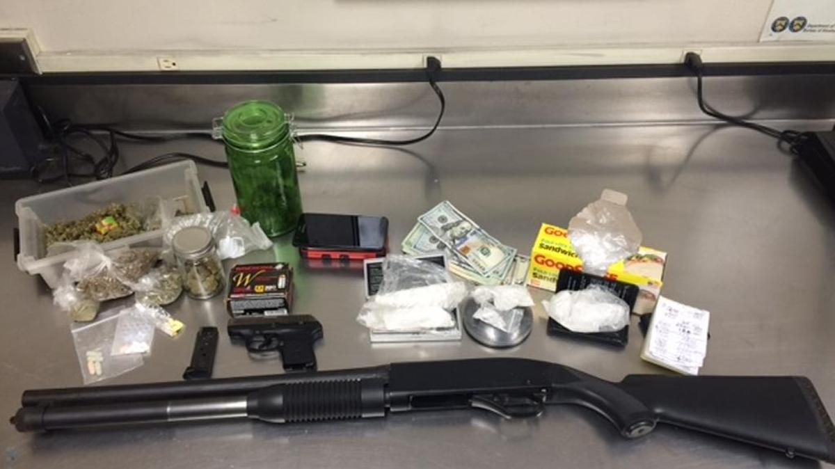 Merced police arrested two people and seized 7 ounces of methamphetamine, two firearms and a “large amount” of marijuana Wednesday, officers reported.