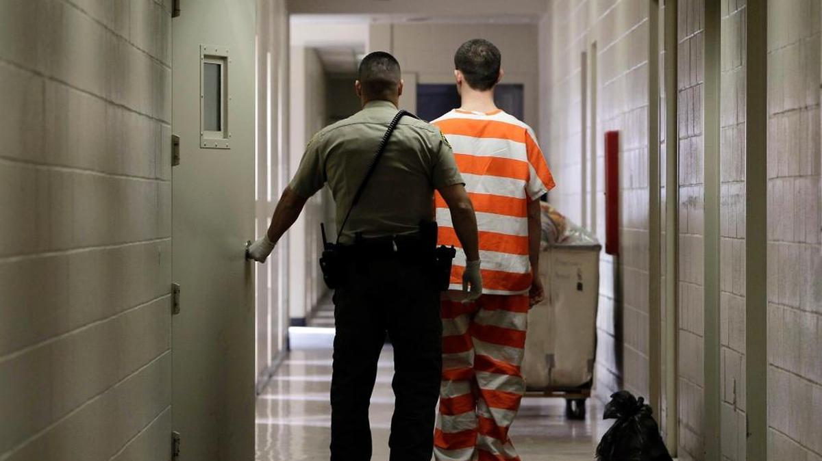 An inmate at the Madera County Jail is taken to a housing unit at the facility in February 2013. The state’s nonpartisan legislative analyst said Monday that legislators should reject Gov. Jerry Brown’s plan to give counties another $250 million for jail construction.