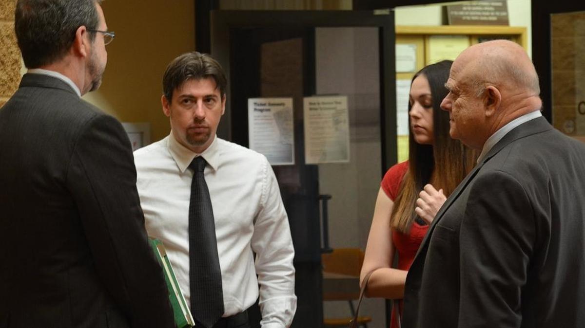 Gary A. Bettencourt and Devyn M. Egan talk to lawyers outside the Merced courtroom Wednesday before their hearing. Bettencourt, a former teacher, and Egan, a former substitute teacher, are accused of having sex with minors. Bettencourt pleaded no contest Friday.