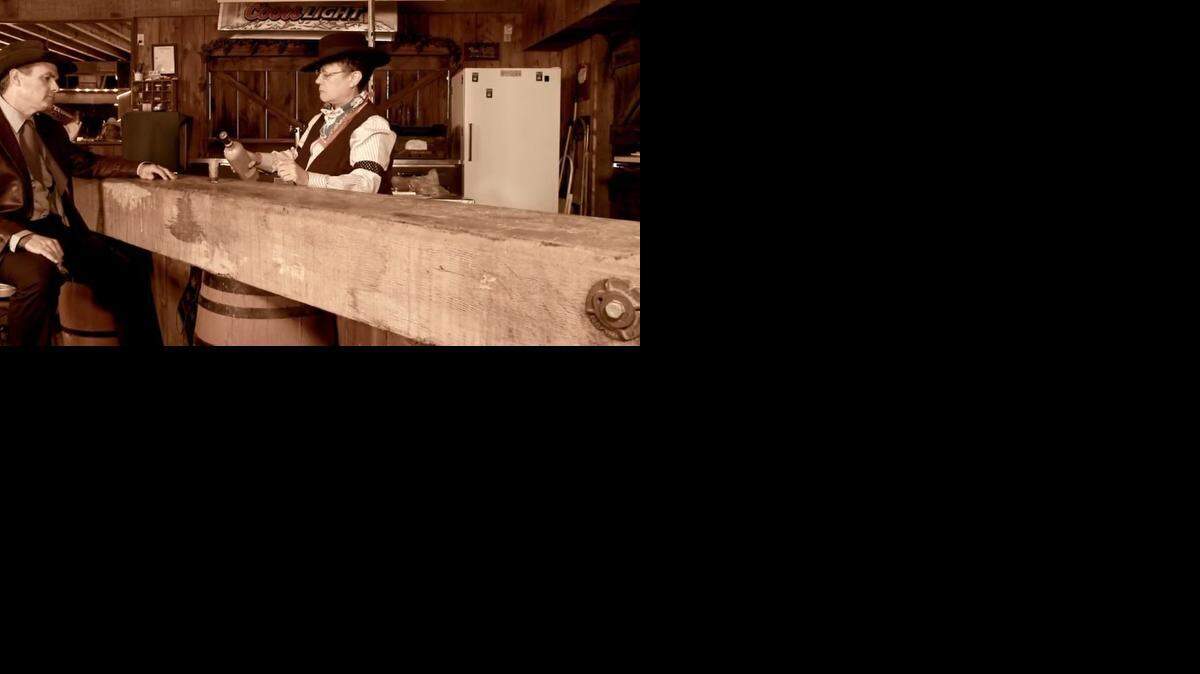 
Human Services Agency Director Ana Pagan pours a shot in this screenshot from “Betsy,” one of several videos produced by Merced County employees for a national association. 
