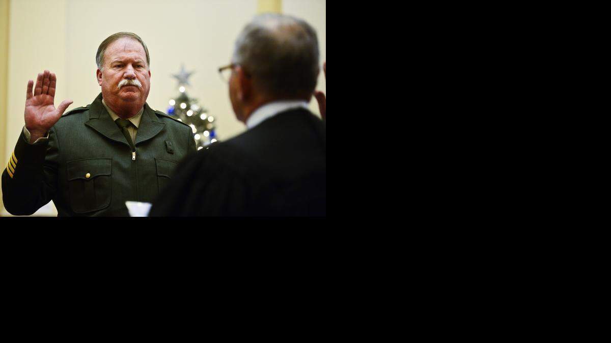 
Merced County Sheriff-elect Vern Warnke, left, is sworn in by Merced County Superior Court Judge Harry L. Jacobs during a ceremony held at the Merced Courthouse Museum in Merced on Tuesday.
