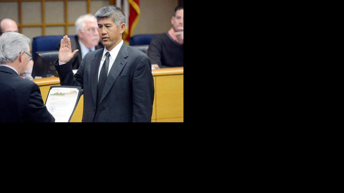 
City Attorney Randolph Hom takes his oath of office during a Merced City Council meeting Monday. 

