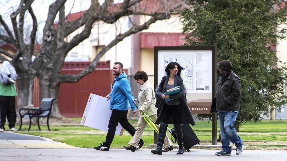 People walk across campus in February at Merced College, which was awarded a $1.5 million grant through the California Community Colleges Chancellor’s Office.