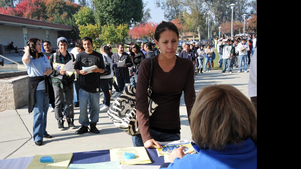 
Brene Favela gets her turn at the registration table at Merced College in 2010. Merced College is hosting its first “Extreme Registration” event Aug. 8 at both the Merced and Los Banos campuses. 

