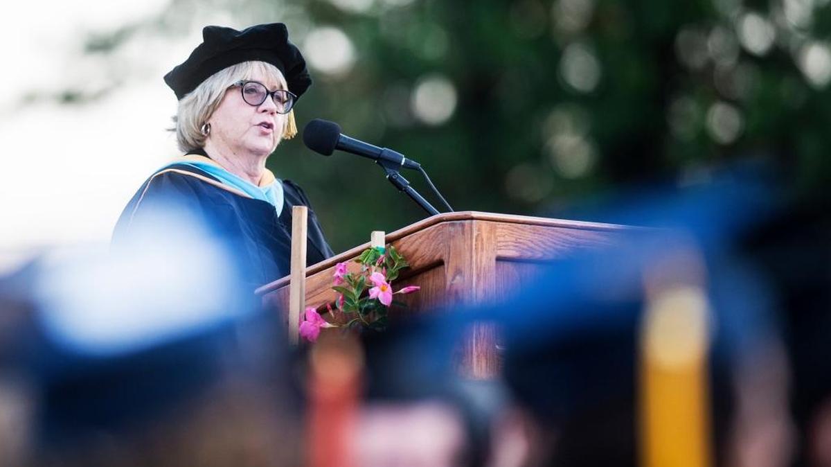 Susan Walsh, acting superintendent and president of Merced College, speaks to graduates during the Merced College graduation ceremony at Stadium ’76/Don Odishoo Field on the campus of Merced College in Merced, Calif., on Friday, May 27, 2016.