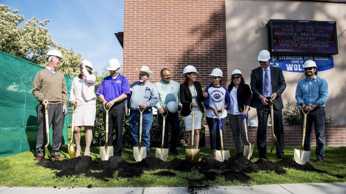 A symbolic groundbreaking ceremony is held at the future home of a health center on the Livingston High School campus in Livingston on Thursday, March 24, 2016. The wellness center, which will be located in buildings that used to contain classrooms, will provide medical, behavioral and dental services on campus and will be the first school-based health center in the district.