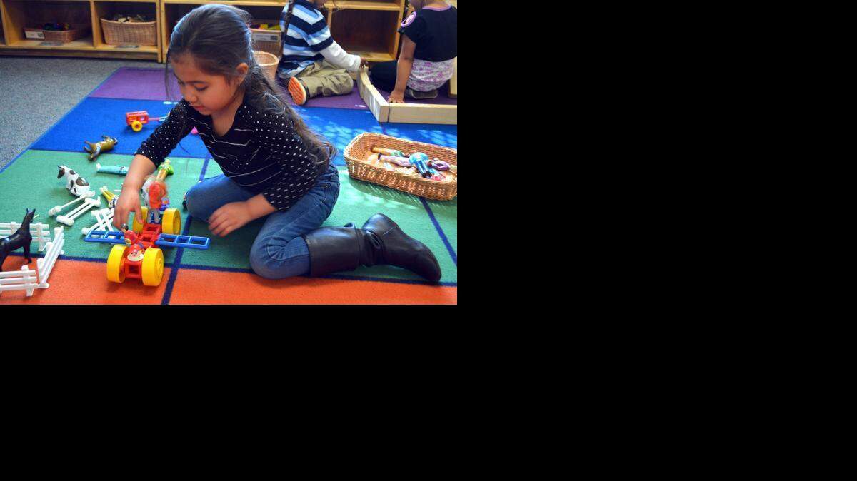 
Zaniah Campos, 4, makes a car-airplane at the Head Start program on the Martone Elementary School campus in Modesto, Calif., on March 3, 2015.
