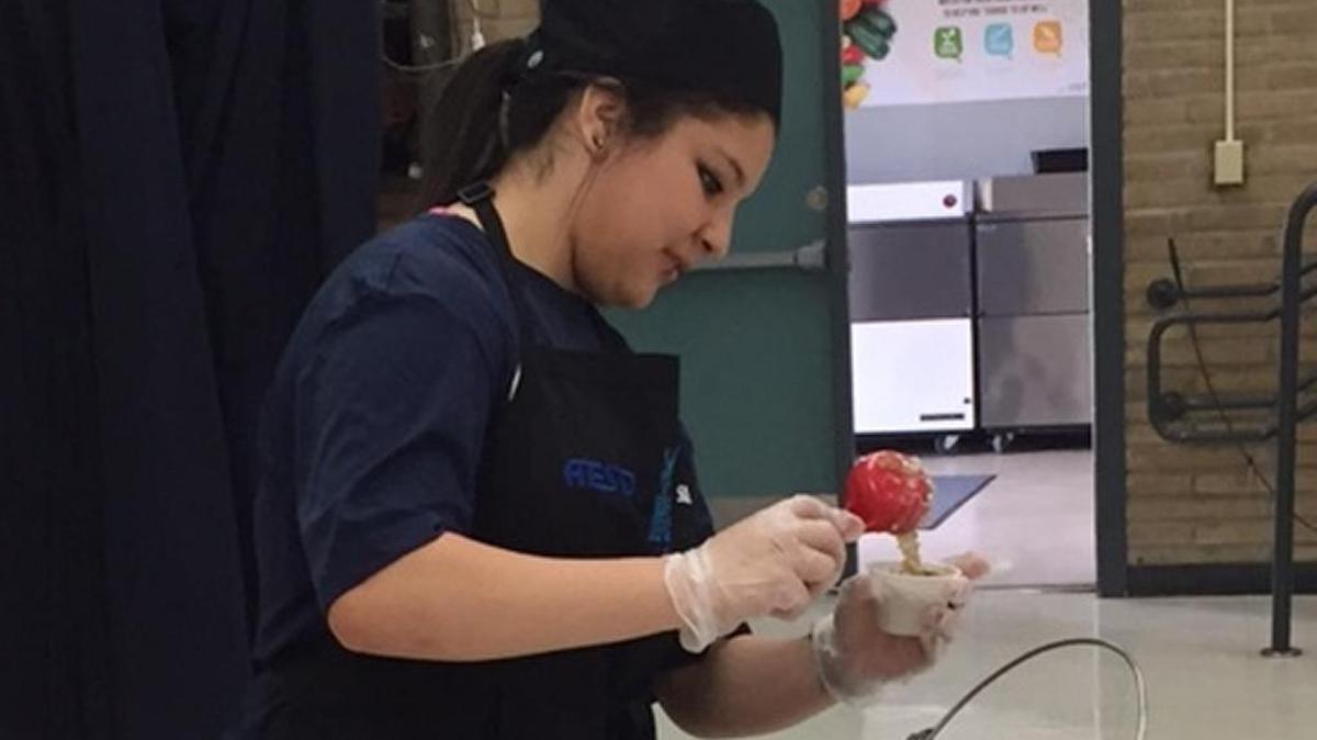 Tara Avila, 14, prepares her award-winning oatmeal during the Future Chef’s Event at Bellevue Elementary School in Atwater. Tara’s oatmeal, “Tara’s Oats,” won first prize at the competition.