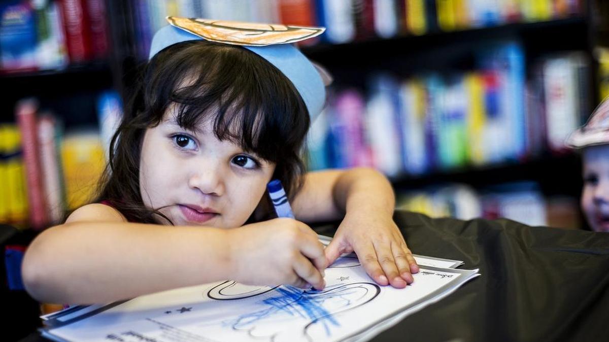 
Natalie Galaviz, 3, of Merced colors during the “Dr. Seuss Spectacular” at Barnes & Noble Booksellers on Friday.
