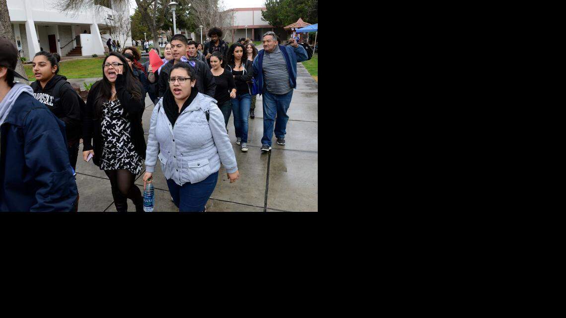 
About two dozen students protest at Merced College on Wednesday, the day after a board of trustees’ decision to cut ties with Everett Lovelace, the dean of student services. He will no longer be employed by the college as of July 1.
