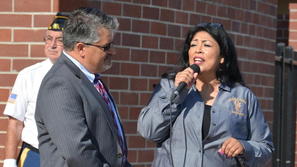 Creekside Junior High School Principal Carolina Moreno speaks during a ceremonial grand opening for the new school Friday, Aug. 5, 2016, at 1401 Prairie Springs Drive. The school was partially funded by a 1995 bond measure that the school district hopes voters will extend on June 5, 2018, so another school and classrooms can be built to alleviate overcrowding.