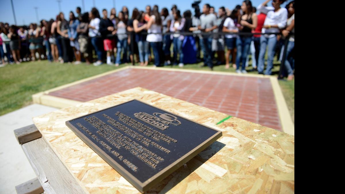 
Students line up for a ceremony at El Capitan High School on Thursday when officials and the school’s alumni association dedicated a time capsule and plaque to be installed on campus. The idea was to bring together the old and new El Capitan schools.
