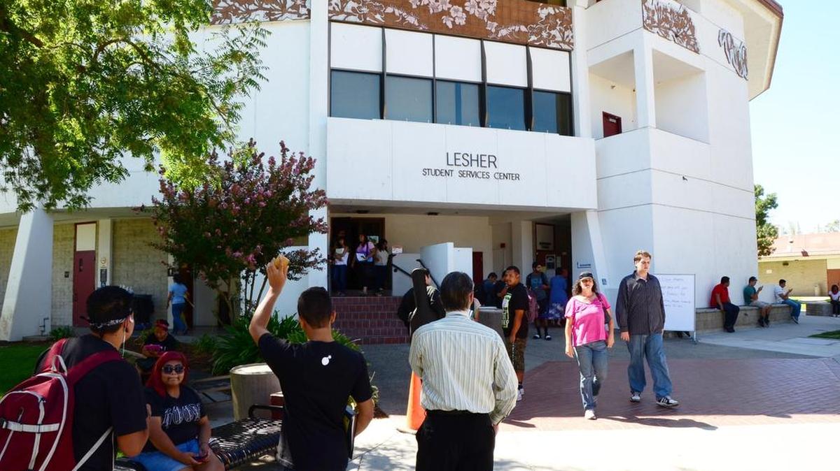 
Students come and go in front of the Lesher Student Services Center during the first week of the fall semester at Merced College in 2013.
