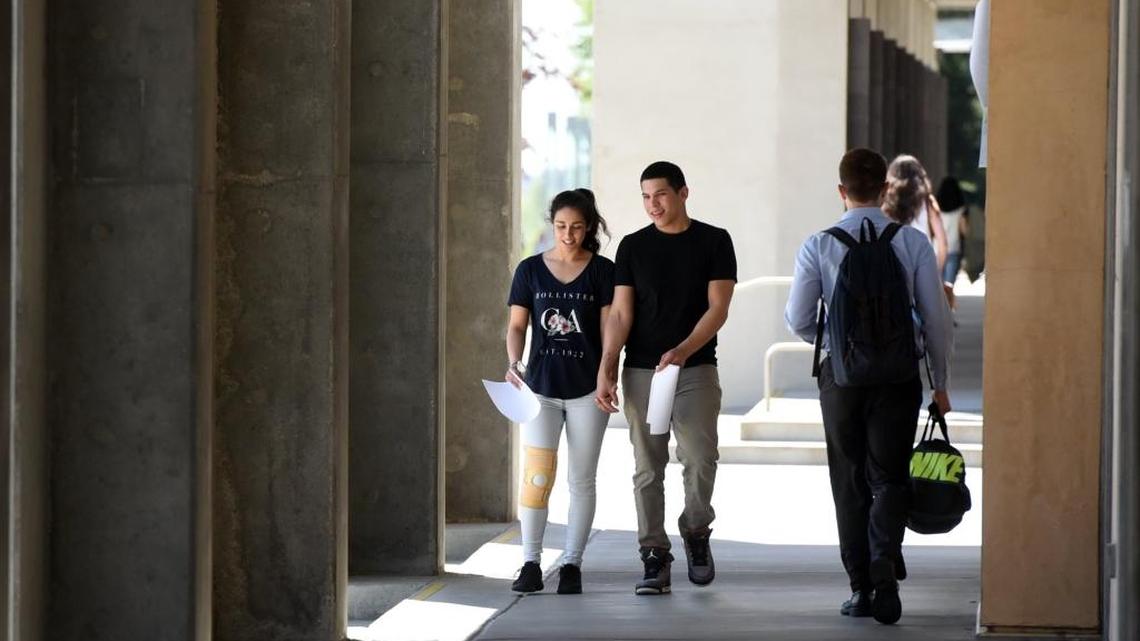 Students walk on the UC Merced campus on Monday, April 4, 2016. The University of California increased the numbers of California residents and minority students it admitted for next year, officials reported Monday.