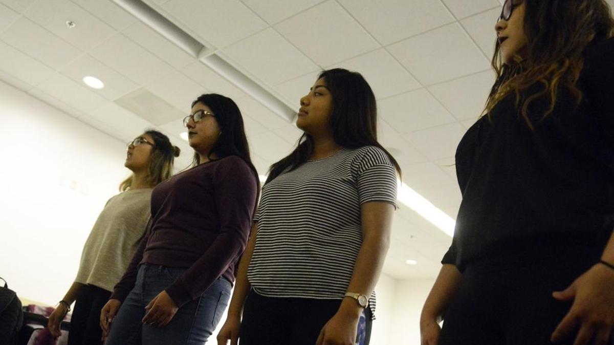 UC Merced students go over their lines for the segment called “For Colored Girls Who Have Considered Suicide/When the Rainbow Is Enuf” by Ntozake Shange during a rehearsal on Tuesday, Dec. 6, 2016. The free Voices of the Revolutionary Theatre Collective show is 6 p.m. Thursday at the Merced Multicultural Arts Center, 645 W. Main St.