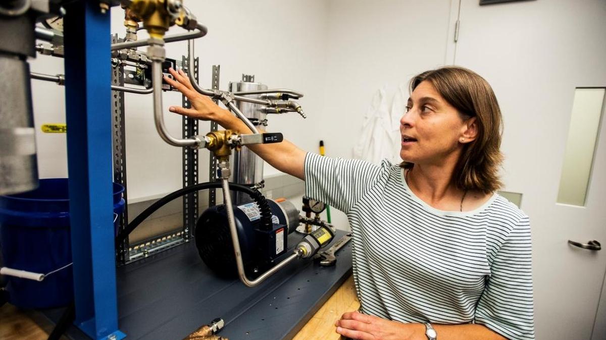 
Ashlie Martini, associate professor in the School of Engineering, explains the function of a filtration test rig at UC Merced on Sept. 3. UC Merced ranks as similar to other Central Valley schools in retaining students and keeping them on track to graduate.
