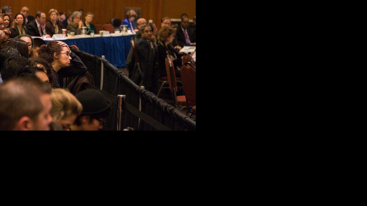
UC Berkeley alumna and BAMN organizer Tania Kappner reacts during the UC Regents meeting at UCSF on Wednesday in San Francisco. 
