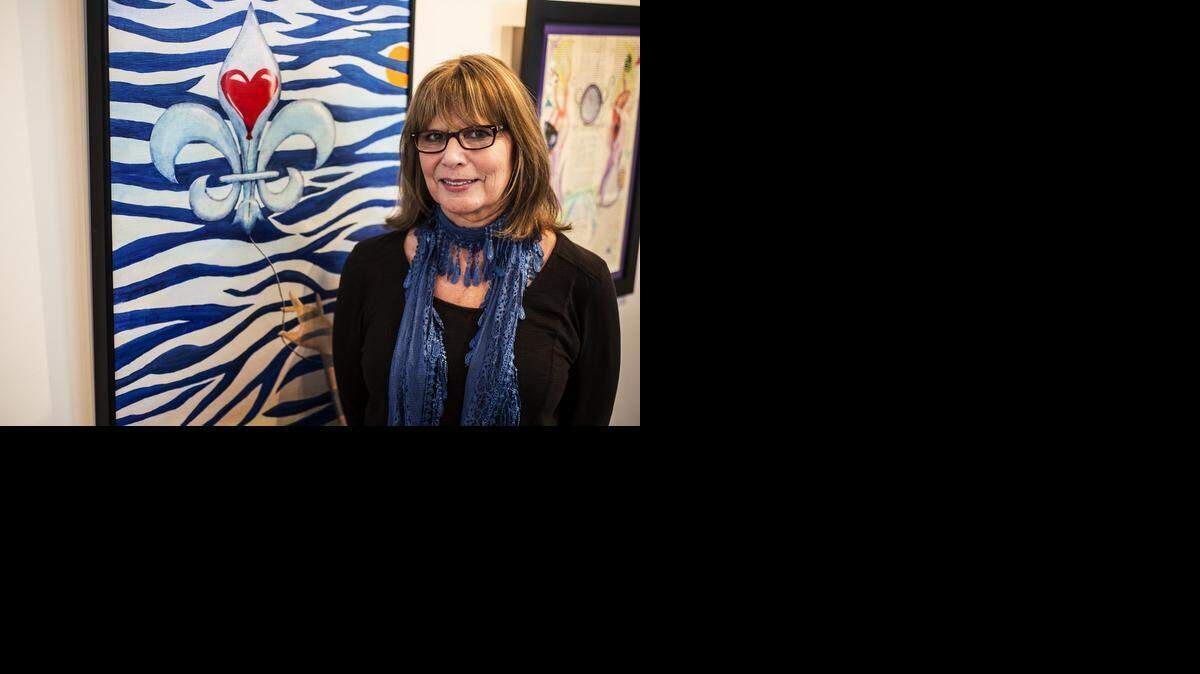 
Gail Benedict, 60, of Merced, stands next to her piece titled "Letting Go" during installation of the 10th annual Bobcat Art Show in the Social Science and Management Building on the University of California, Merced campus in Merced, Calif., Wednesday. UC Merced Presents, headed by Benedict, will open the show April, 6, with a reception.

