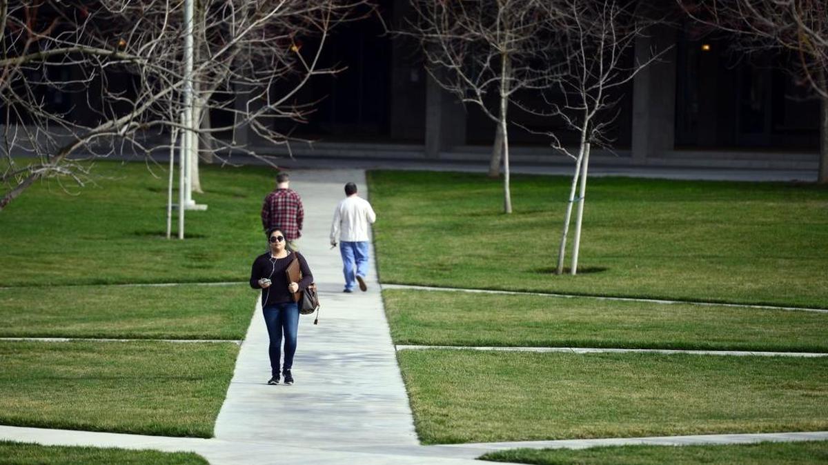 Students walk along a pathway in January at UC Merced, which won a small victory this week when the state Department of Finance gave the plans for expansion a preliminary nod of approval.