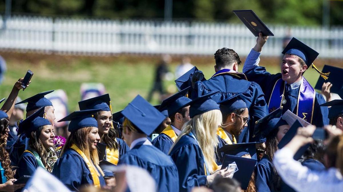 UC Merced graduates cheer during commencement for the school of Social Sciences, Humanities and Arts on Saturday, May 14, 2016.