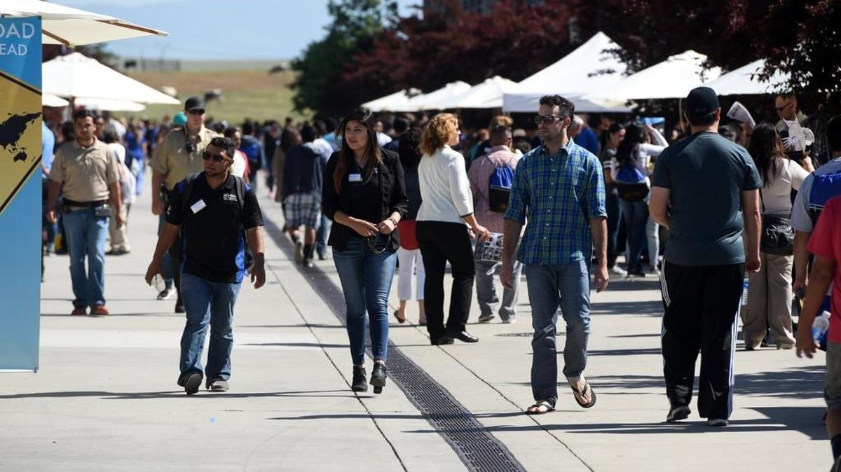 Thousands of admitted students and their families walk UC Merced on Saturday, April 16, 2016, during Bobcat Day. For many, it was their first visit to the campus and the city of Merced.