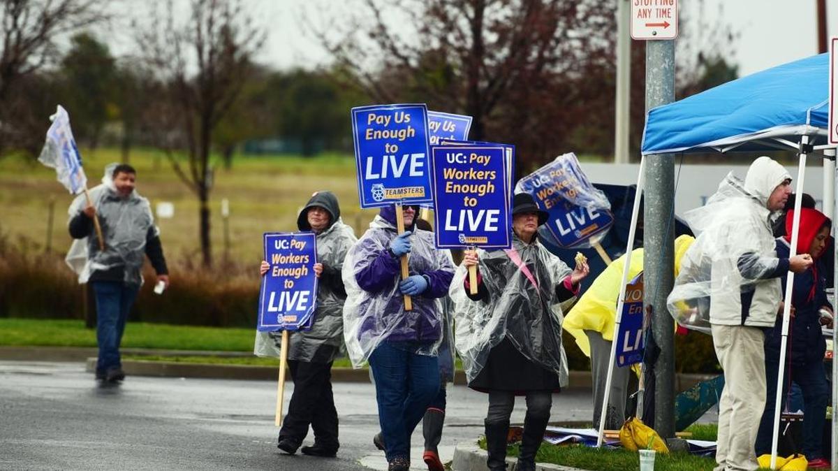 Administrative, clerical and support staff from UC Merced protest outside the campus Tuesday, asking for a better contract. The approximately 12,000 administrative, clerical and support workers from across the University of California who are represented by Teamsters Local 2010 were expected to join the strike.