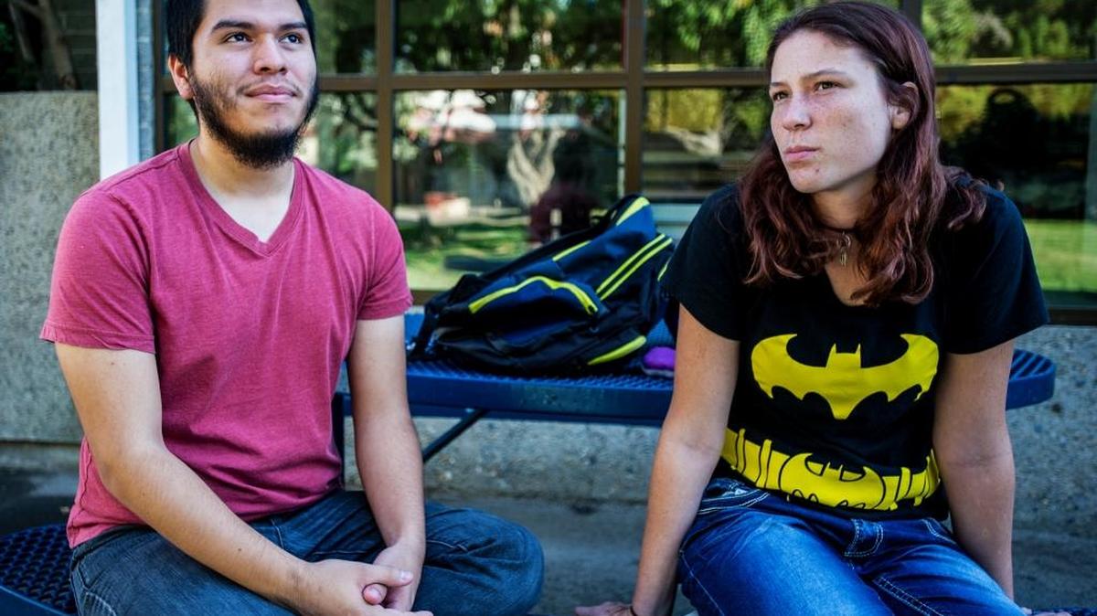 
Merced College students Kenny Espinosa, 20, of Merced, left, and Leanne Huber, 20, of Atwater speak about campus safety at Merced College on Friday, Oct. 2, 2015. According to the Merced Community College District 2015 Annual Security Report and Crime Statistics, there were two robberies, one vehicle theft and a case of domestic violence reported on or near campus in 2014. 
