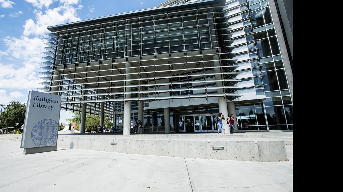 
Students exit the Kolligian Library at UC Merced on Wednesday. UC Merced will host the third UndocuGrads conference on Aug. 1 for undocumented students interested in pursuing graduate school. 
