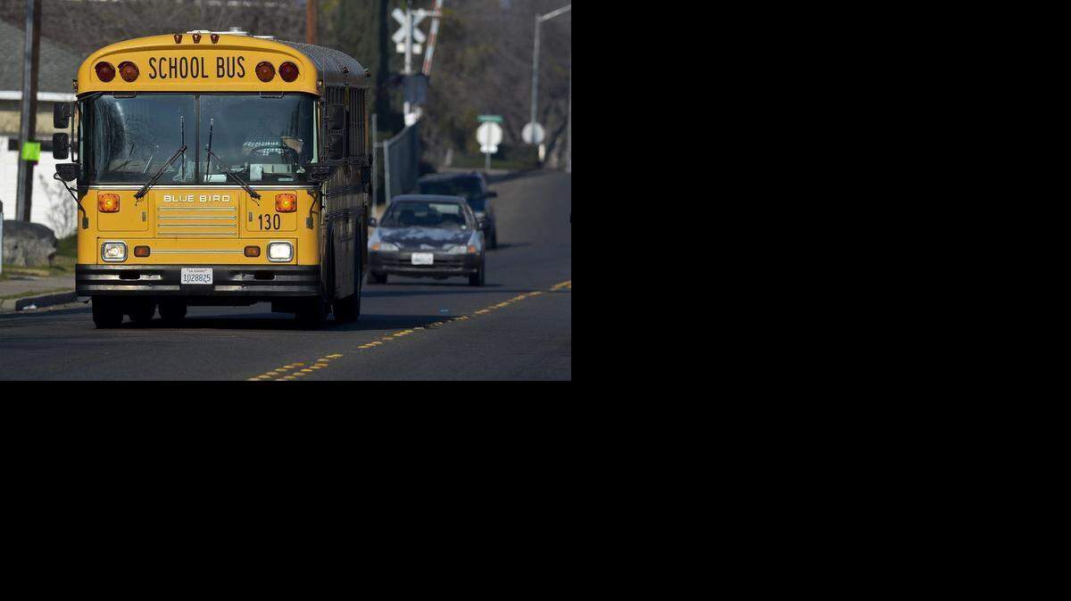 
A school bus drives along Glenn Avenue in Merced on Thursday. The Merced City School District board chose new boundaries for elementary schools on Tuesday.
