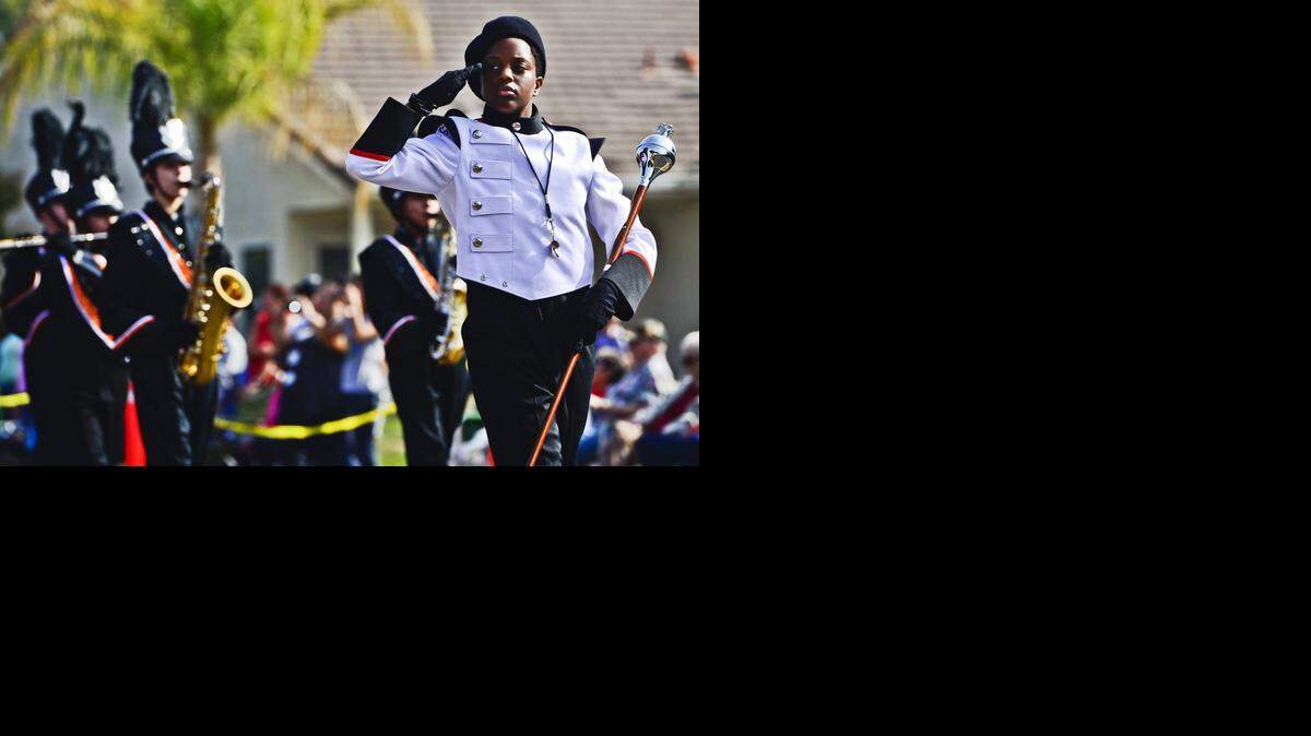 
Merced High School drum major Anea Fielder salutes the judges during the 55th annual Central California Band Review at Golden Valley High School in Merced, on Saturday.
