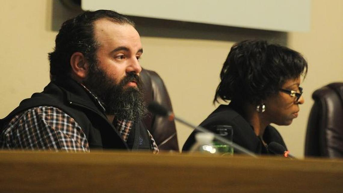 Los Banos Unified School District Board member John Mueller talks about the proposed junior high school during the Feb. 12, 2015, board meeting.