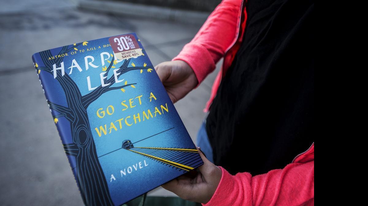 
Monique Anguino, 16, of Merced holds her copy of Harper Lee’s “Go Set a Watchman” outside Barnes & Noble in Merced.
