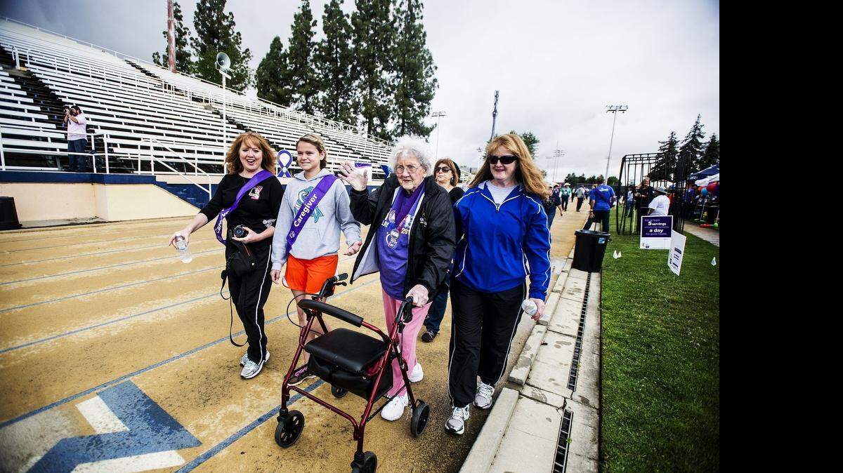 
Colon cancer survivor Willie Mae Gentry, 97, of Merced, waves to supporters during Saturday’s Relay for Life at the Merced College track. It was Gentry’s 19th time participating in the event.
