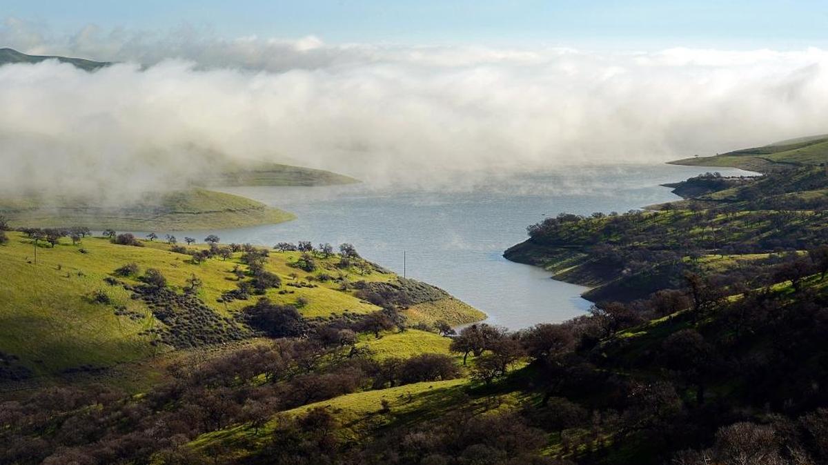 Low clouds and fog shroud parts of San Luis Reservoir as seen near Dinosaur Point on Tuesday, Jan. 24, 2017.