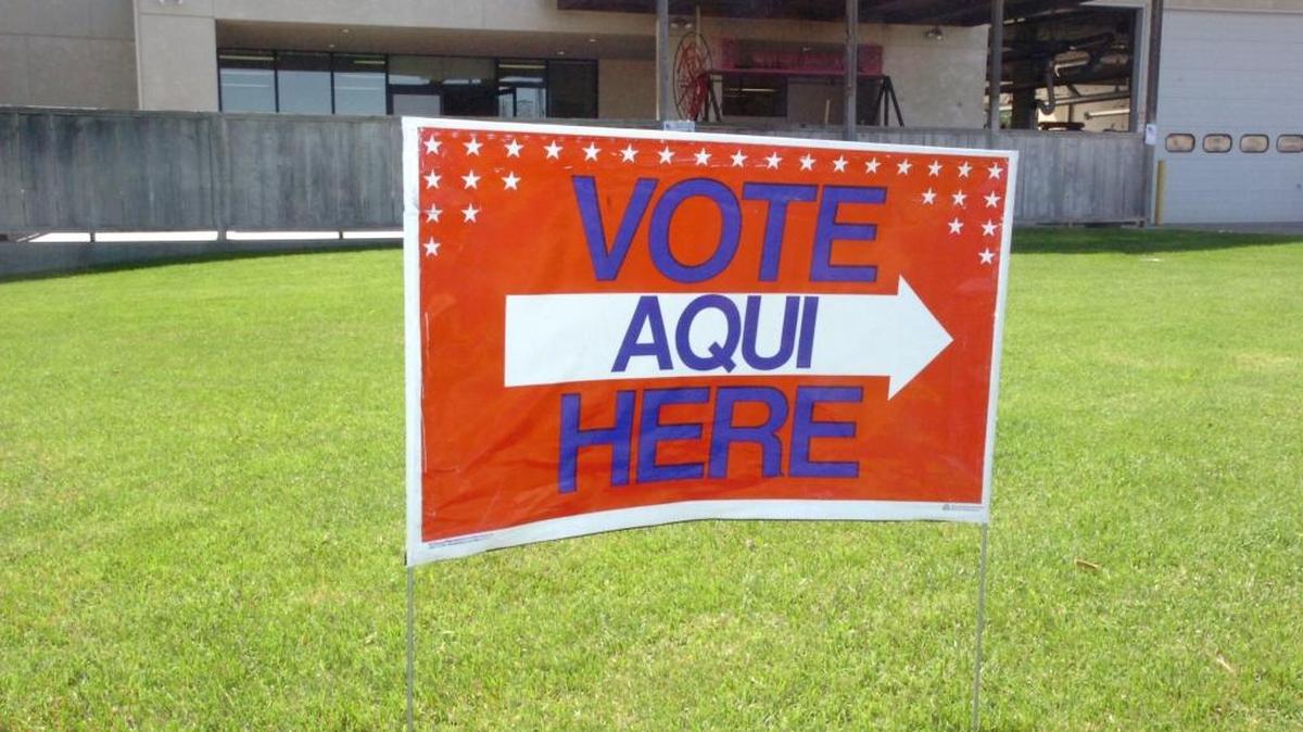 A sign outside the Los Banos Fire Station 1 precinct directs voters where to go to vote last year. There are a number of organizations making a push to register voters.