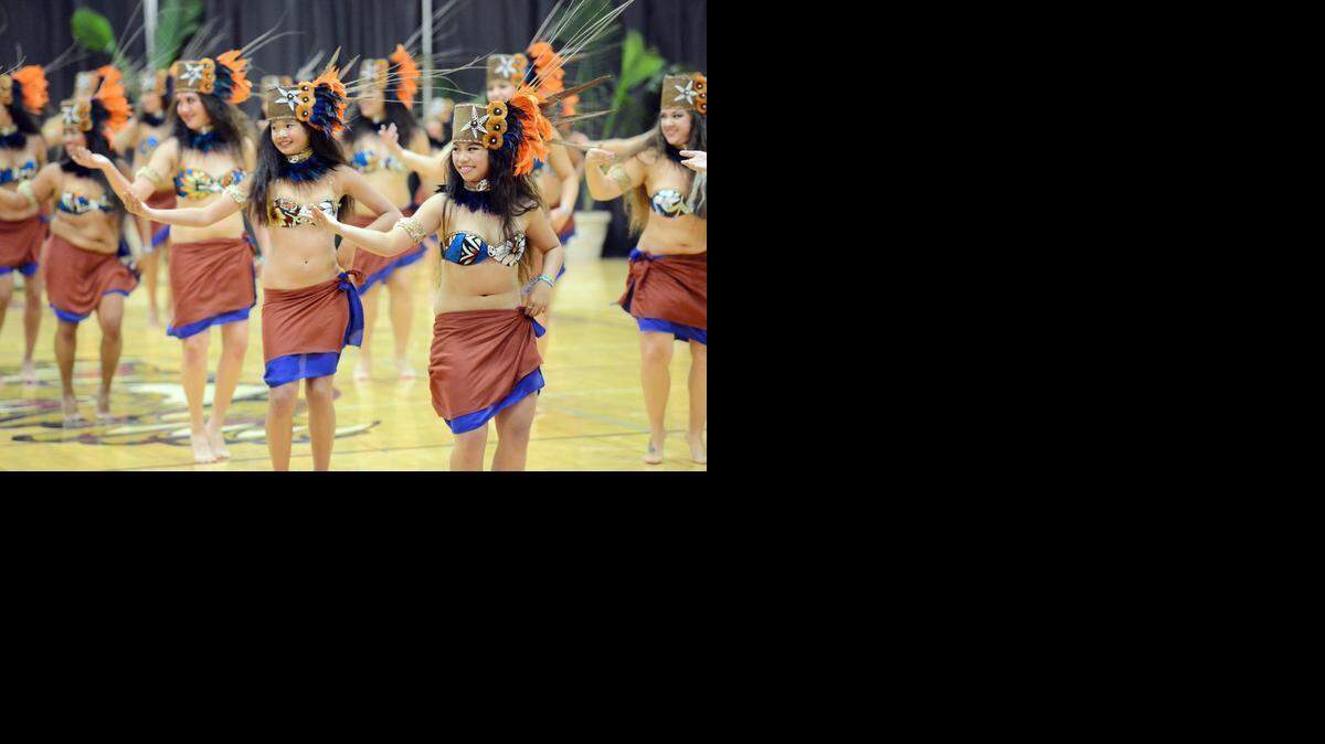 
Performers from Aloha Hula Dance Studio in Granada Hills dance during the Kiki Raina Tahiti Fete group dance competition last year. Tahitian dance, food, wares and more will be part of the festival, which runs Friday through Sunday in Merced. 
