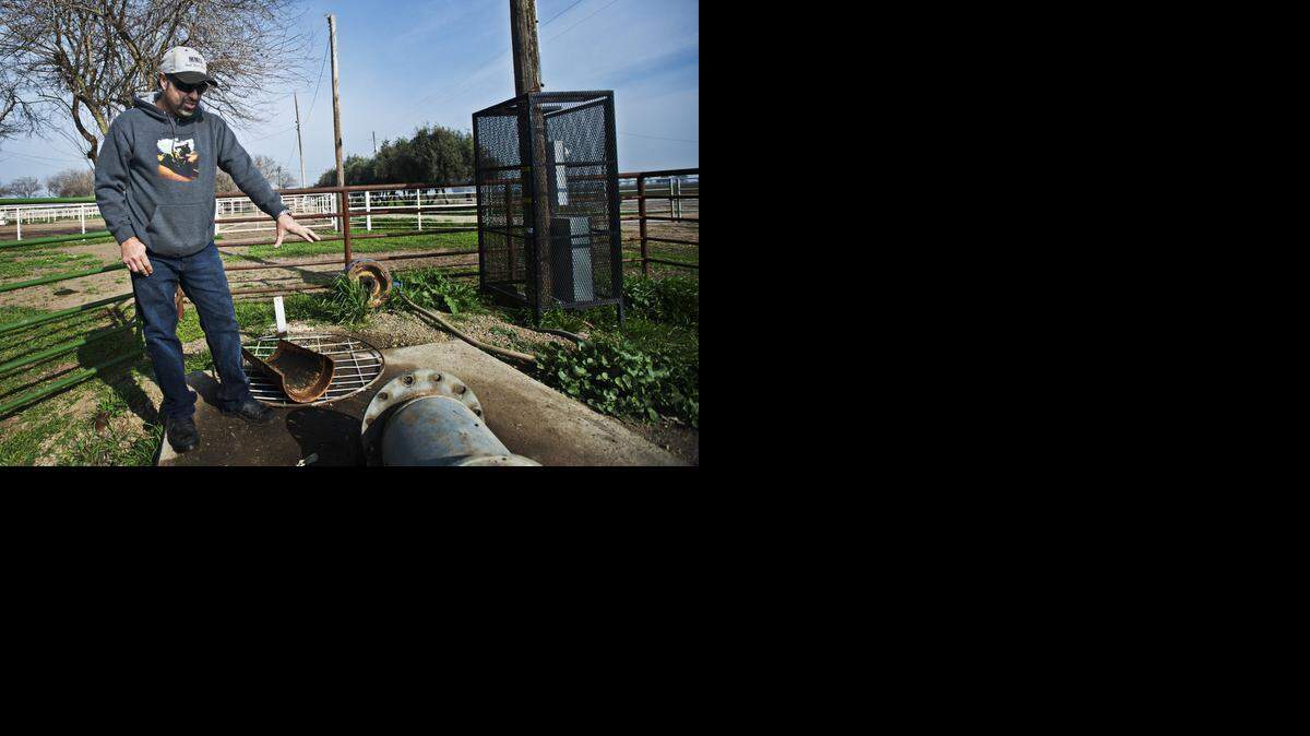 
Manager of the San Felipe Ranch, Paul Sousa, 42, speaks about a groundwater pump that is temporarily out of service on the ranch, located at 4455 Lone Tree Road in Merced. The ranch has had to fallow 300 acres of land and extend water wells due to the drought and excessive pumping by neighboring ranches.
