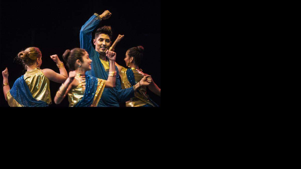 
Omar Jimenez, 23, of Livingston, performs with fellow members of The Dancers' Studio on a Bollywood number during the Kaleidoscope Dance Performance Showcase at the Merced College Theater in Merced., Calif., Saturday, Feb. 21, 2015. The event which began more than 20 years ago, showcases some of the area's best dance studios. Proceeds from the show will be used to fund scholarships for dance students.
