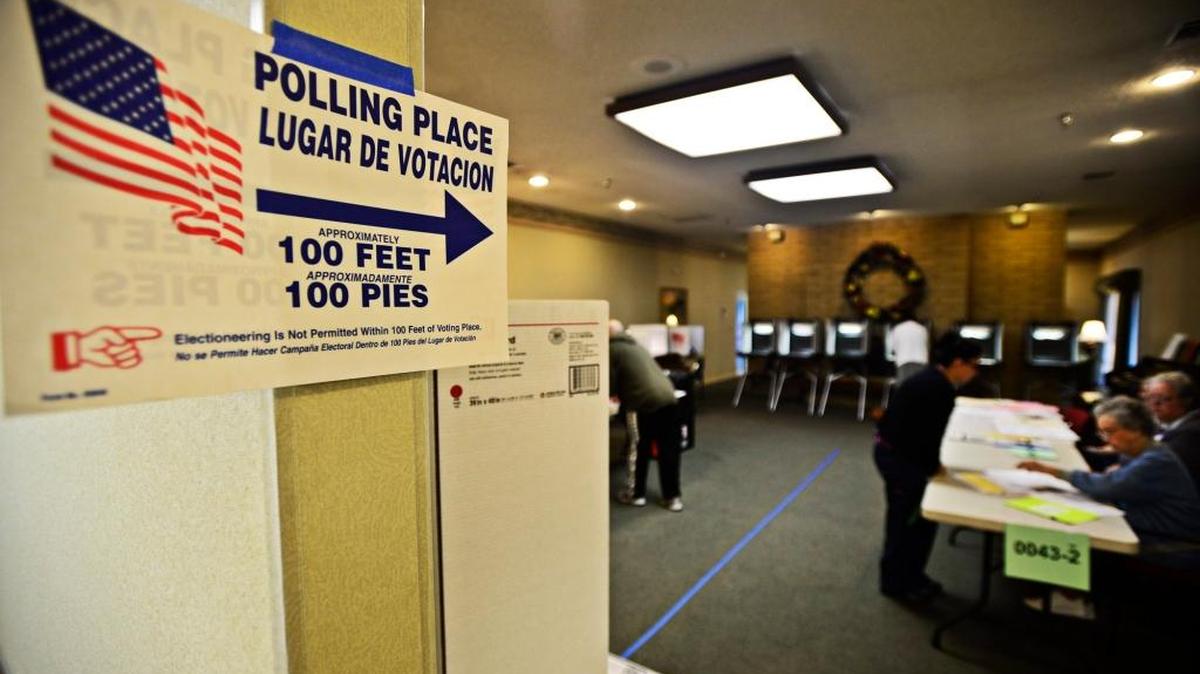 Merced residents vote at a polling place 3050 M St. in 2014. More and more people in the county now vote by mail.