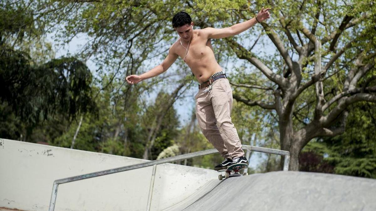 Dacian Jones, 20, of Merced, performs a 50-50 grind at the Applegate Skate Park in Merced, Calif., on Thursday, April 5, 2018. According to Jones, he skates at the park everyday.