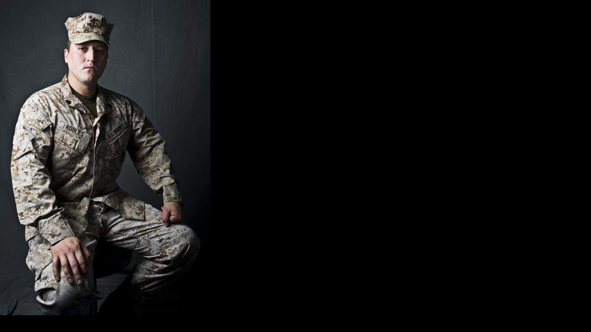 
Marine Corps veteran Ricardo Robles, 28, of Winton poses for a portrait in Merced, Calif., on Thursday, Oct. 23, 2014.
