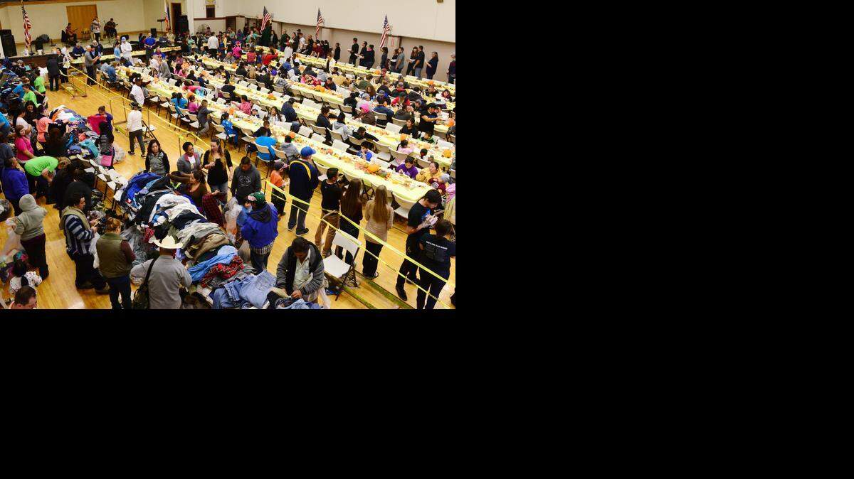 
More than an estimated 1,000 eat and pick through clothes during the annual Merced County Rescue Mission Thanksgiving meal Thursday. Volunteers and donations make it happen every year, according to mission staff.
